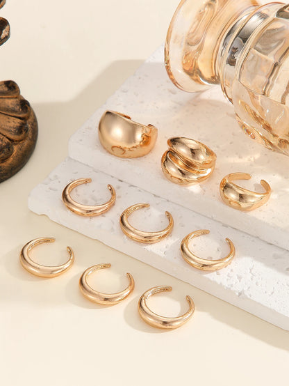 A set of nine uniquely designed, asymmetrical double-layered arc-shaped rings, perfect for women to wear daily or at parties.